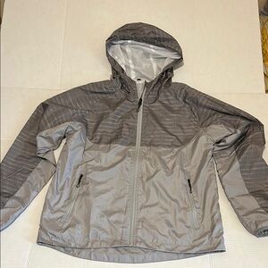 NWOT Large Unisex Gray Lightweight Zip Hooded Jacket with zip pockets.